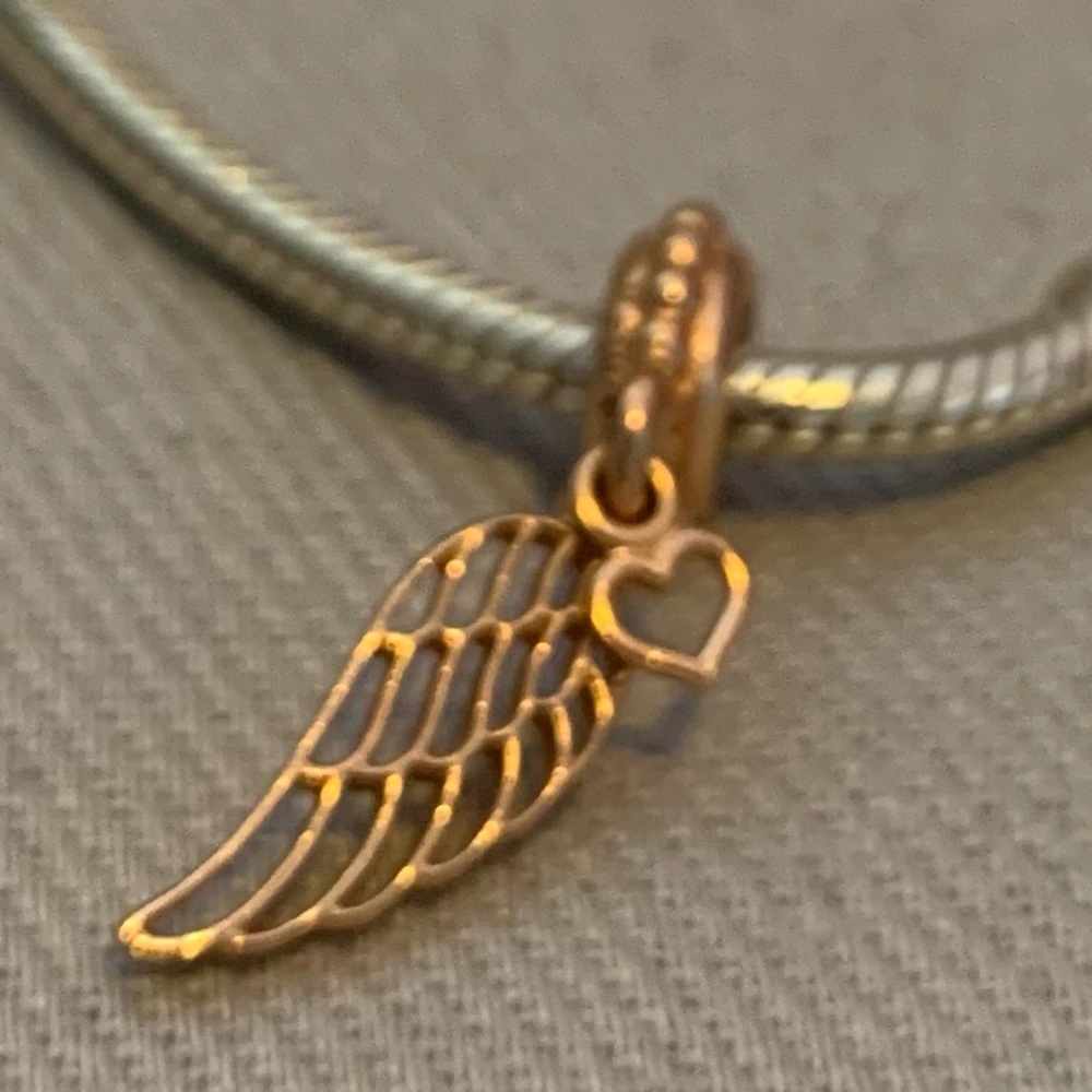 Pandora dangly wing heart charm in rose gold